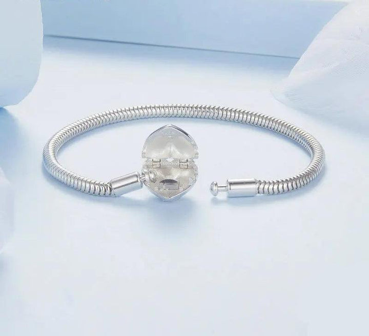 VI - Sterling Heart Charm Bracelet